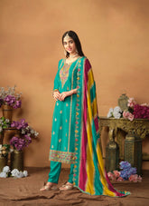 Enchanting Looking Partywear Salwar Suit in Sea Green Colour